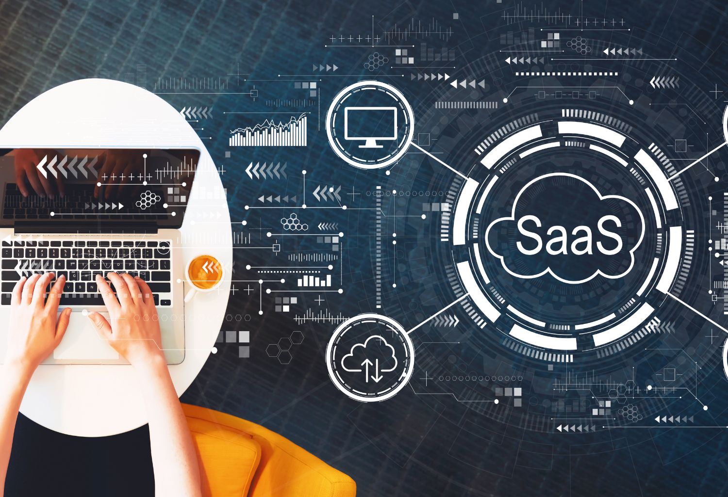 SaaS - Software as a service concept with person using a laptop on a white table. SaaS Industry